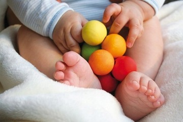 Прорезыватель Grimm RAINBOW PEARLS с захватом WOOD 0+