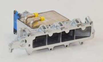 Впускной коллектор с охладителем наддувочного воздуха 04L129711AB OE ORIGINAL
