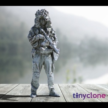 Soldier in ghillie helmet The Printing Goes Ever O