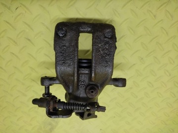 AUDI 80 1.9 TDI ZACISK HAMULCOWY LEWY TYŁ