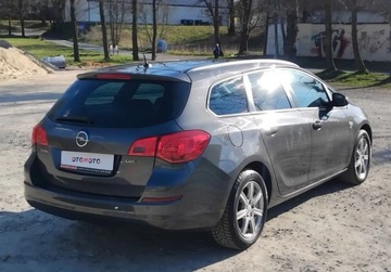 Opel Astra J Sports Tourer 1.7 CDTI ECOTEC 110KM 2012 Opel Astra 1,7 Cdti Alufelgi Klima El szyby Po oplatach z Niemiec, zdjęcie 13