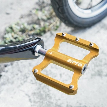 Педали-платформы, нескользящие, прочные, сверхлегкие велосипедные из алюминиевого сплава, золотого цвета.