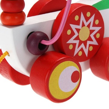 Деревянная утка, переплетенный лабиринт, который нужно тянуть за веревочку.