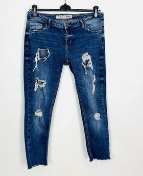Jeansowe elastyczne spodnie rurki dziury XL 42 Denim Co.