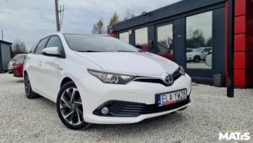 Toyota Auris II Touring Sports Facelifting 1.8 Hybrid 136KM 2016 Toyota Auris 1.8Hybryda Panorama Navi kamera climatronic 100 bezwypadek, zdjęcie 4