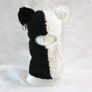 Ręcznie robiona na drutach ciepła czapka polarowa