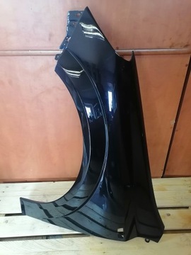 BŁOTNIK ASTRA H Z20R LEWY BARANEK