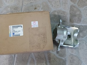 ZACISK HAMULCA PRZÓD LEWA OPEL ASTRA INSIGNIA 95522633 OE