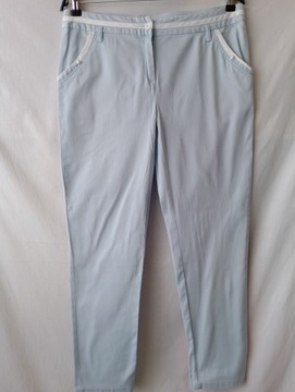 Spodnie jasnoniebieskie bawełniane z białymi lamówkami - 40