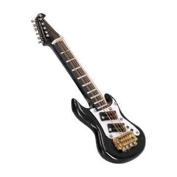 Миниатюрный магнит на холодильник с гитарой.