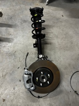 ZWROTNICA NOGA AMORTYZATOR MCPHERSON LEWY PRZÓD SPORTAGE V TUCSON IV