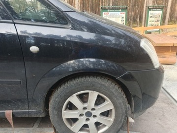 BŁOTNIK PRAWY PRZÓD PRZEDNI OPEL MERIVA A 05 1.7 CDTI 74KW Z20R foto