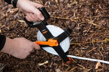 ИЗМЕРИТЕЛЬНАЯ ЛЕНТА NEO ИЗМЕРИТЕЛЬНАЯ МЕРА ИЗ СТЕКЛОСТЕКЛА ГЕОДЕЗИАНСКАЯ 50М В РУКАНЕ
