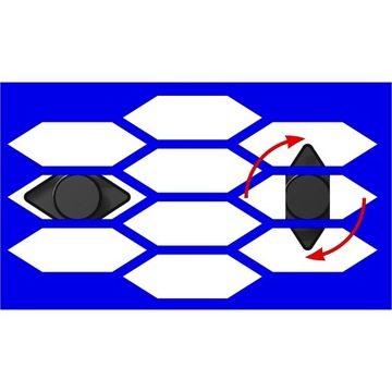 Держатель номерного знака, установленный в сотовой решетке Audi.