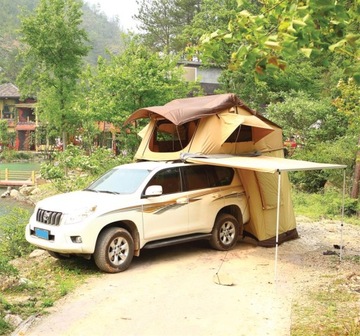 Боковой навес 1,4 х 2 м (рольставни/тент), крепящийся к багажнику на крыше.