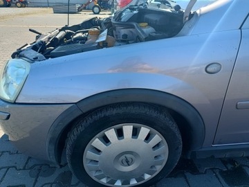 OPEL CORSA C BŁOTNIK LEWY PRZEDNI Z163