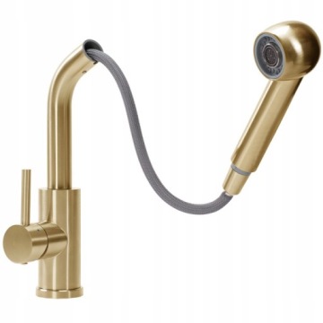 Кухонный смеситель стоит золотистого трой