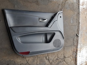 KORANDO III TAPICERKA BOCZEK DRZWI LEWY PRZEDNI