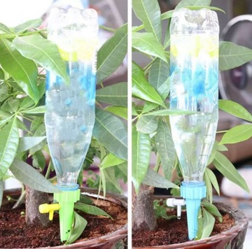 Бутылка капельного полива для цветочных горшков с кранами.