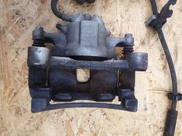 RENAULT TALISMAN ZACISK LEWY PRZÓD