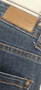 1058. BB S Jeans granatowe jeansy rurki z zamkami i cyrkoniami r 40