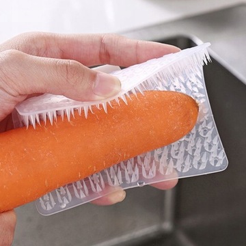 Щетка для мытья посуды на кухне.