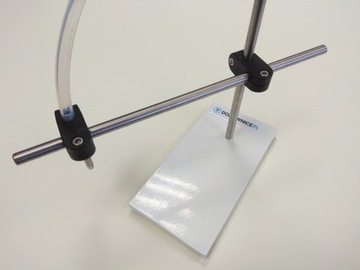 ДЕРЖАТЕЛЬ ДЛЯ НАПОЛНИТЕЛЯ ПЕРИСТАЛЬТИЧЕСКОГО НАСОСА