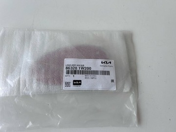 KIA VENGA ZNAK ZNAKY KRYT KUFRU 86320-1W200 ORIGINÁLNÍ