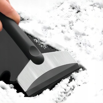 Автомобильный скребок не рисует к бокалу ледяного мороза.