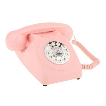 Старомодный настольный телефон розового цвета.