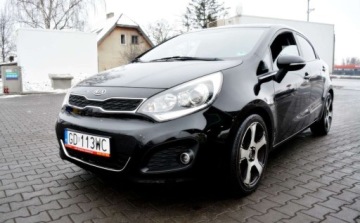 Kia Rio III Hatchback 3d 1.2 DOHC CVVT 85KM 2012 Kia Rio Szyberdach, Ledy, Czujniki parkowania, KeyLess Bluetooth 1.2 85KM, zdjęcie 14
