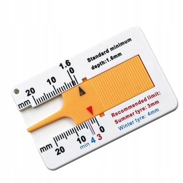 Линейка для измерения глубины протектора шин.