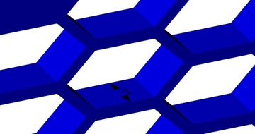 Держатель номерного знака, установленный в сотовой решетке Audi.