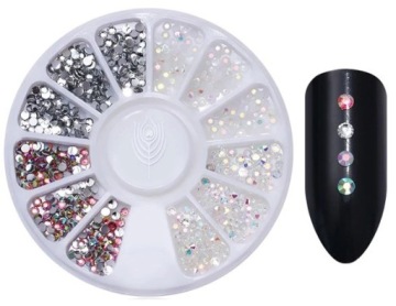 KARUZELA Z CYRKONIAMI OZDOBY CYRKONIE