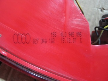 Фонарь заднего бампера Audi Q7 4L0945095