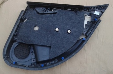 Tapicerka lewa boczek drzwi lewy tył Opel Astra V K 39060599