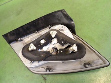 Lampa lewa tylna tył OPEL ASTRA H III 05r KOMBI 24451838