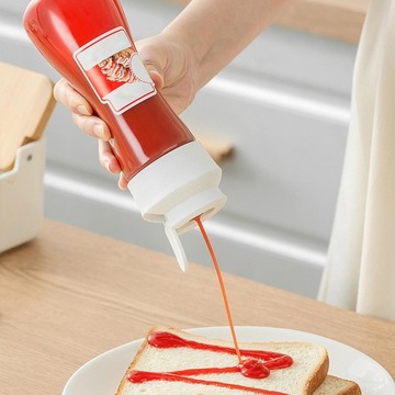 Бутылка для заправки для салата с завинчивающейся крышкой.