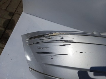 NÁRAZNÍK PŘEDNÍ STŘÍBRNY VOLVO V70 II FACELIFT 04-07R. 08693340
