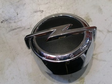 OPEL CORSA E ZNACZEK EMBLEMAT KLAMKA KLAPY 563697283