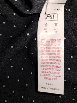 Bluzka damska w kropeczki F&F ozdobiona ukośną plisą rozm. 50