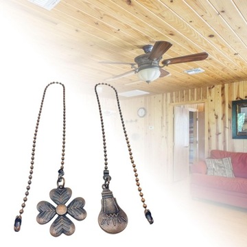 Удлинительная цепочка веером с декором в виде красно-коричневых шариков.