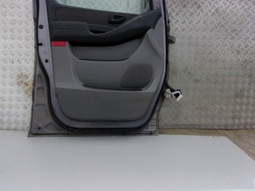 DVEŘE LEVÝ PŘEDNÍ HYUNDAI H1 09R ^