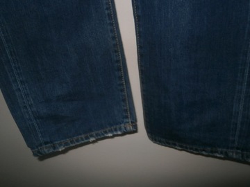 Dsquared2 spodnie dżinsowe z dziurami 54