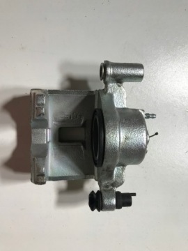 ПЕРЕДНИЙ ЛЕВЫЙ ТОРМОЗНОЙ СУППОРТ MAZDA 323F 626 PREMACY
