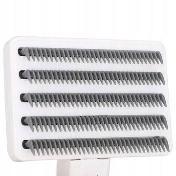 Щетка для расчесывания собачьей шерсти.