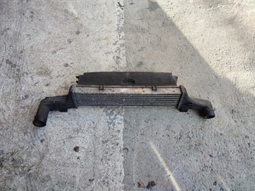 CHŁODNICA POWIETRZA INTERCOOLER Z OSŁONĄ MERCEDES W210 A2105001300 ORYGINAŁ