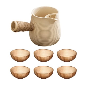 Porcelanowy czajniczek i 6 filiżanek z kwitnącymi i sypkimi liśćmi herbaty