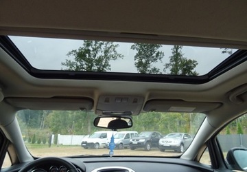 Opel Astra J Sports Tourer Facelifting 1.7 CDTI ECOTEC 110KM 2013 Opel Astra 1.7d-klimatron-duze radio-alu-0placony 1.7 Diesel 110KM, zdjęcie 4