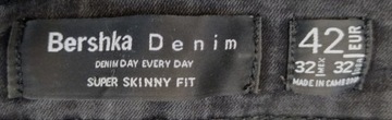 Spodnie rurki damskie jeans BERSHKA 42 Czarne